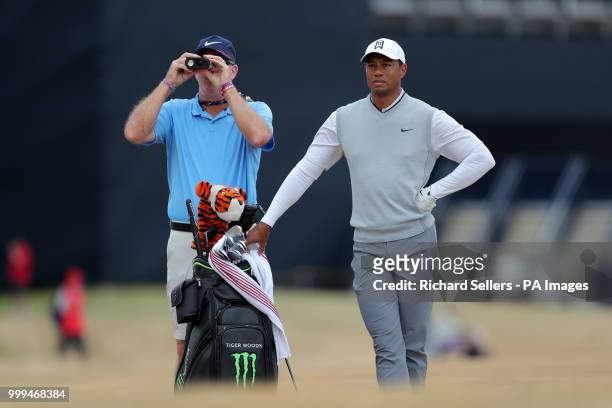 Tiger Woods with his caddy during preview day one of The Open Championship 2018 at Carnoustie Golf Links, Angus.