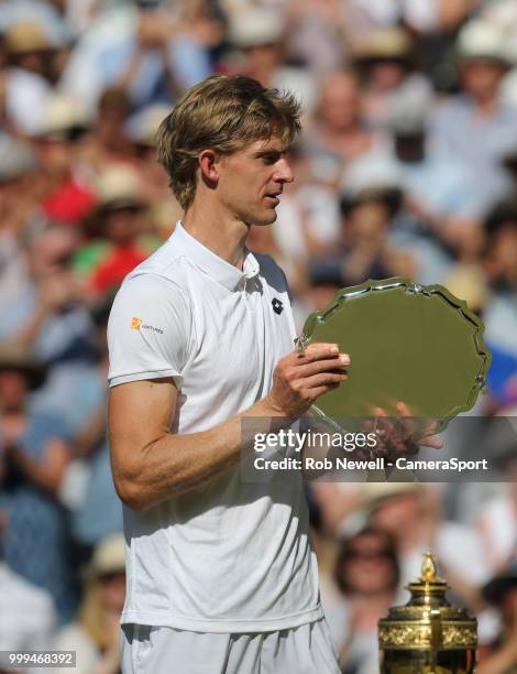 Kevin Anderson with the runner-up trophy after losing his match against Novak Djokovic in the Final of the Gentlemen's Singles at All England Lawn...