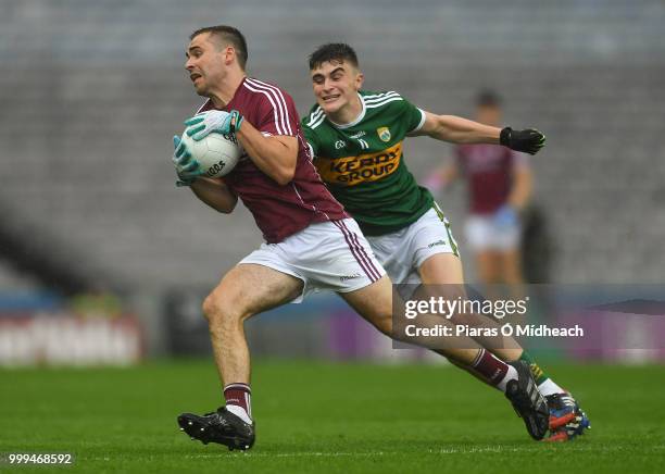 Dublin , Ireland - 15 July 2018; Cathal Sweeney of Galway in action against Seán OShea of Kerry during the GAA Football All-Ireland Senior...