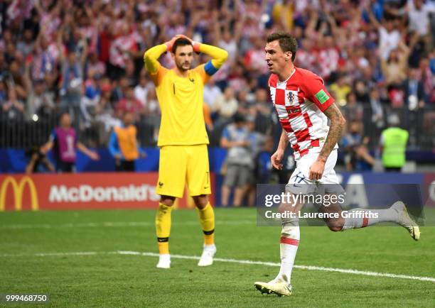 Mario Mandzukic of Croatia celebrates after scoring his team's second goal past Hugo Lloris of France during the 2018 FIFA World Cup Final between...