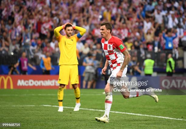 Mario Mandzukic of Croatia celebrates after scoring his team's second goal past Hugo Lloris of France during the 2018 FIFA World Cup Final between...