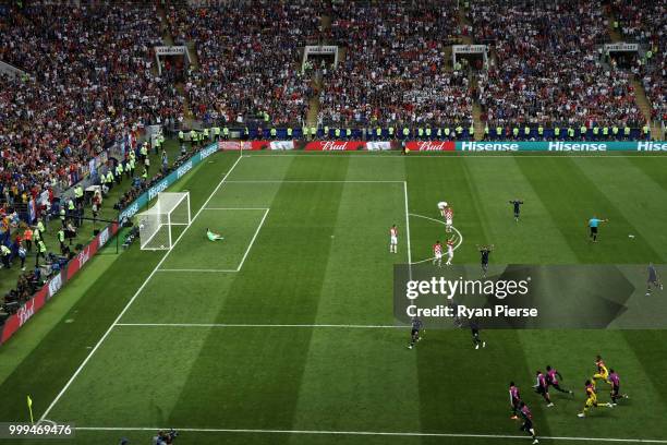 Kylian Mbappe of France celebrates with team mates after scoring his team's fourth goal during the 2018 FIFA World Cup Final between France and...