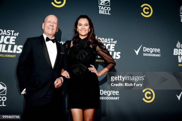 Bruce Willis and Emma Heming attend the Comedy Central Roast of Bruce Willis at Hollywood Palladium on July 14, 2018 in Los Angeles, California.
