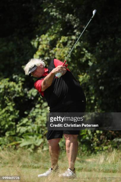 Laura Davies of England plays a tee shot on the eighth hole during the final round of the U.S. Senior Women's Open at Chicago Golf Club on July 15,...