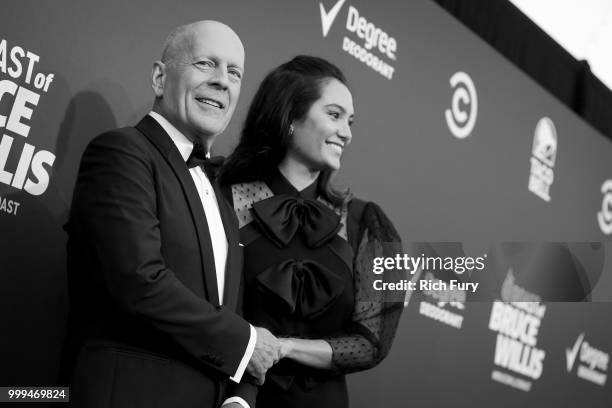 Bruce Willis and Emma Heming attend the Comedy Central Roast of Bruce Willis at Hollywood Palladium on July 14, 2018 in Los Angeles, California.