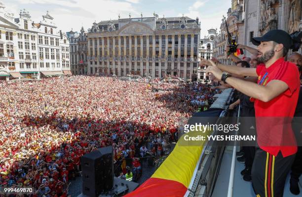 Belgium's Yannick Carrasco celebrates at the balcony in front of more than 8000 supporters at the Grand-Place, Grote Markt in Brussels city center,...