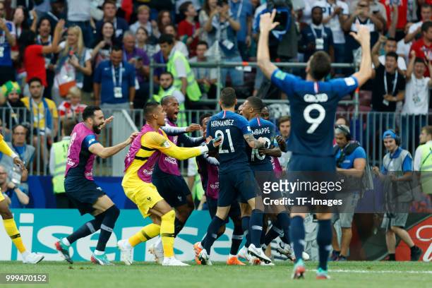 Kylian Mbappe of France celebrates with team mates after scoring his team's fourth goal during the 2018 FIFA World Cup Russia Final between France...