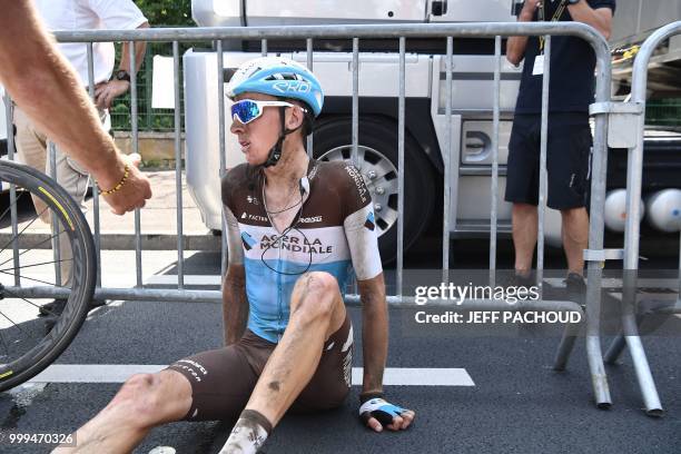 France's Romain Bardet gets up after catching his breath following the ninth stage of the 105th edition of the Tour de France cycling race between...