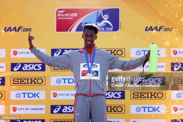 Jordan A.Diaz of Cuba celebrates celebrates with his medal during the medal ceremony for the men's triple jump on day five of The IAAF World U20...