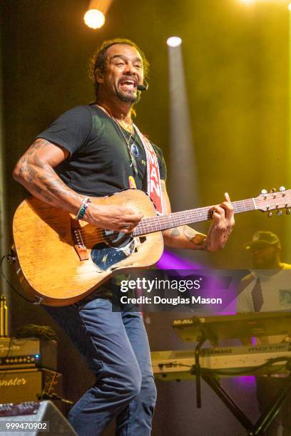 Michel Franti and Spearhead performs during the Green River Festival 2018 at the Greenfield Community College on July 14, 2018 in Greenfield,...