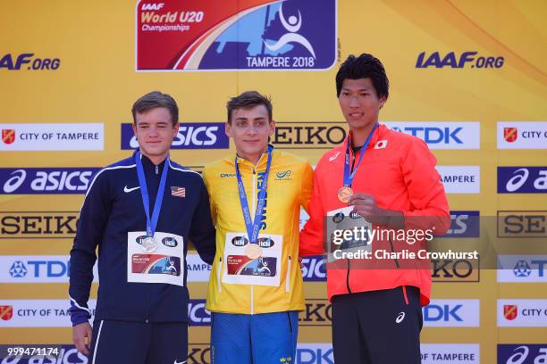 Zachery Bradford of The USA, Armand Duplantis of Sweden and Masaki Ejima of Japan celebrate with their medals during the medal ceremony for the men's...