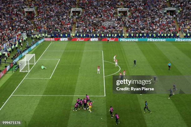 Kylian Mbappe of France celebrates with team mates after scoring his team's fourth goal during the 2018 FIFA World Cup Final between France and...