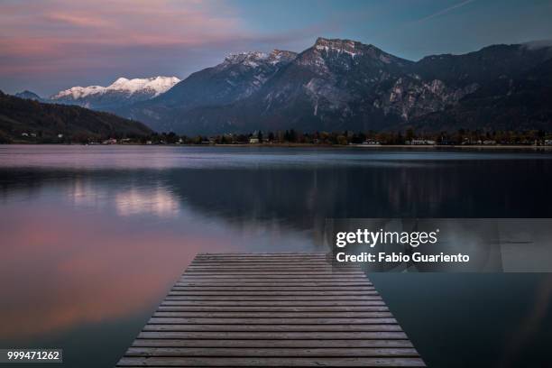 sunset at caldonazzo - caldonazzo stock pictures, royalty-free photos & images
