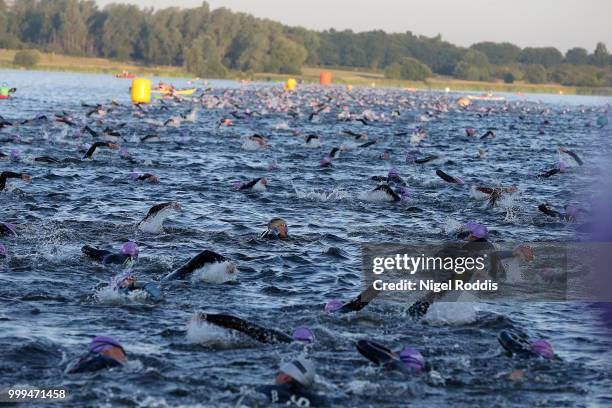 Athletes compete in the swim section of Ironman UK on July 15, 2018 in Bolton, England.
