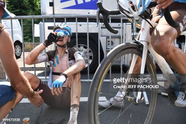 France's Romain Bardet hydrates following the ninth stage of the 105th edition of the Tour de France cycling race between Arras and Roubaix, northern...