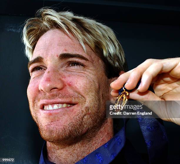 Jason Akermanis of the Brisbane Lions, who won the AFL Brownlow Medal poses for photo's during a media conference at the Gabba in Brisbane,...