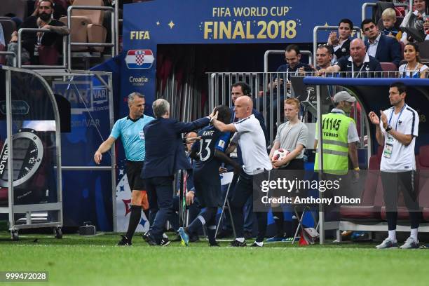 Ngolo Kante of France and Didier Deschamps head coach of France during the World Cup Final match between France and Croatia at Luzhniki Stadium on...