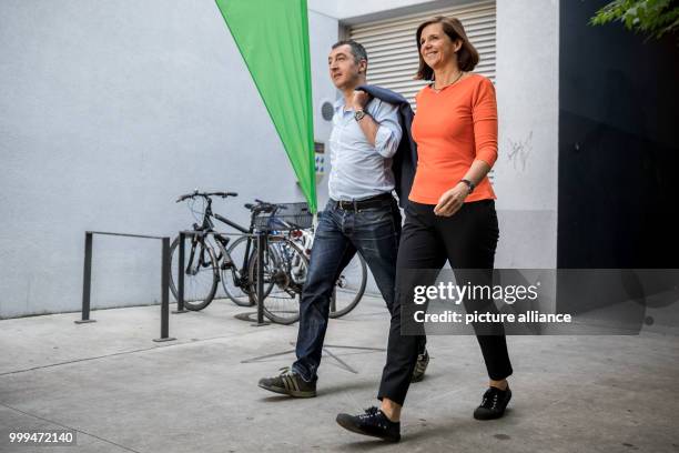 Cem Oezdemir, federal chairman of the Buendnis 90/Die Gruenen party and leading candidate for the general elections, arrives together with Katrin...