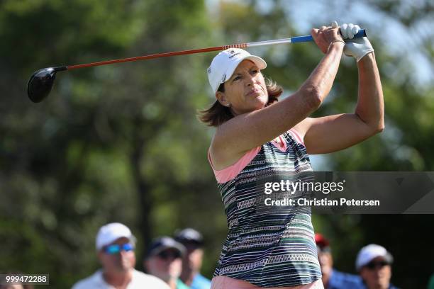 Juli Inkster plays a tee shot on the second hole during the final round of the U.S. Senior Women's Open at Chicago Golf Club on July 15, 2018 in...