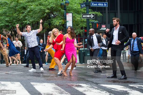 Adam Devine, Rebel Wilson, Priyanka Chopra and Liam Hemsworth are seen filming a scene for 'Isn't It Romantic?' in Midtown on July 15, 2018 in New...