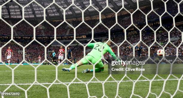 Goalkeeper Danijel Subasic of Croatia is beaten by a shot from Kylian Mbappe for France's fourth goal during the 2018 FIFA World Cup Final between...