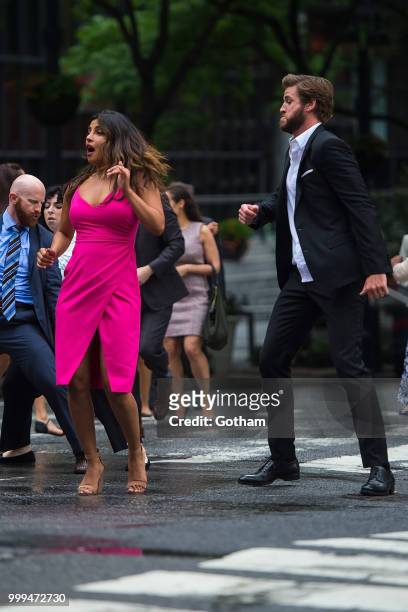 Priyanka Chopra and Liam Hemsworth are seen filming a scene for 'Isn't It Romantic?' in Midtown on July 15, 2018 in New York City.