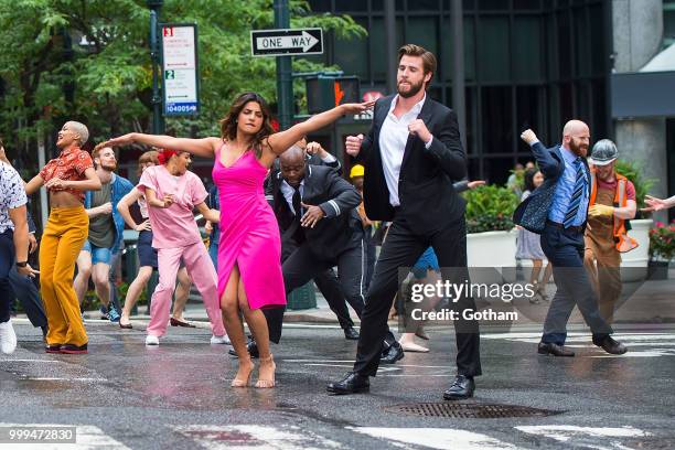 Priyanka Chopra and Liam Hemsworth are seen filming a scene for 'Isn't It Romantic?' in Midtown on July 15, 2018 in New York City.