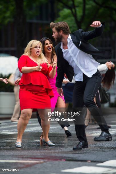 Rebel Wilson, Priyanka Chopra and Liam Hemsworth are seen filming a scene for 'Isn't It Romantic?' in Midtown on July 15, 2018 in New York City.