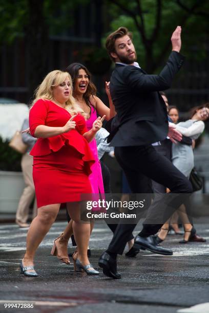 Rebel Wilson, Priyanka Chopra and Liam Hemsworth are seen filming a scene for 'Isn't It Romantic?' in Midtown on July 15, 2018 in New York City.