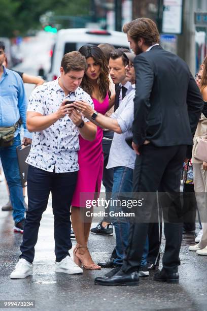 Adam Devine, Priyanka Chopra and Liam Hemsworth are seen filming a scene for 'Isn't It Romantic?' in Midtown on July 15, 2018 in New York City.