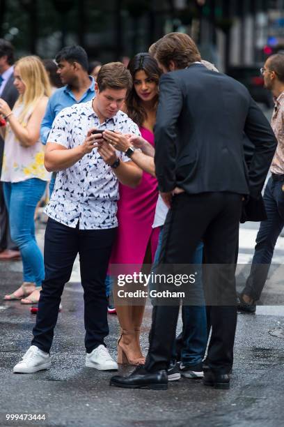 Adam Devine, Priyanka Chopra and Liam Hemsworth are seen filming a scene for 'Isn't It Romantic?' in Midtown on July 15, 2018 in New York City.