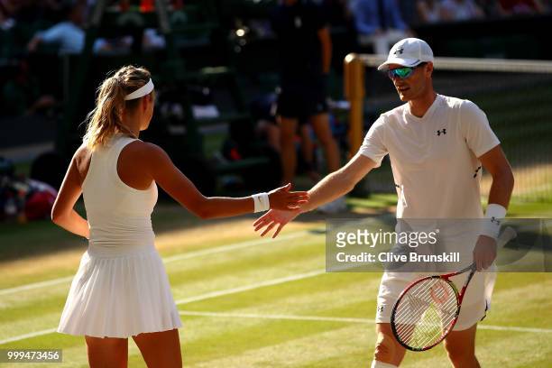 Jamie Murray of Great Britain and Victoria Azarenka of Belarus celebrate a point against Alexander Peya of Austria and Nicole Melichar of The United...