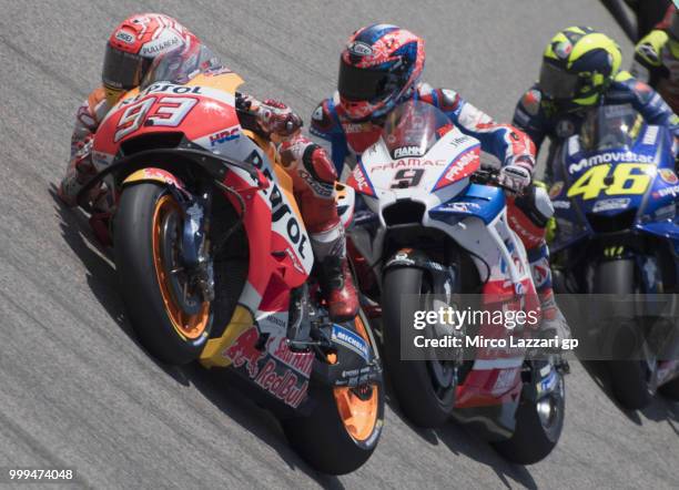 Marc Marquez of Spain and Repsol Honda Team leads the field during the MotoGP race during the MotoGp of Germany - Race at Sachsenring Circuit on July...