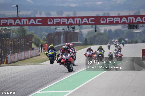 Jorge Lorenzo of Spain and Ducati Team leads the field during the MotoGP race during the MotoGp of Germany - Race at Sachsenring Circuit on July 15,...