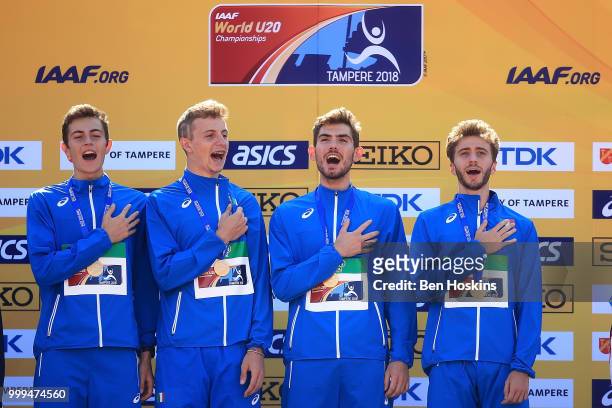 Klaudio Gjetja, Andrea Romani, Alessandro Sibilio and Edoardo Scotti of Itay celebrate with their medals during the medal ceremony for the men's...