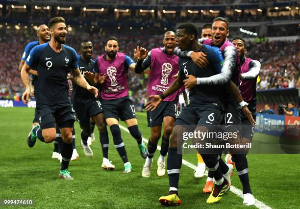 Paul Pogba of France celebrates with team mates after scoring his team's second goal during the 2018 FIFA World Cup Final between France and Croatia...