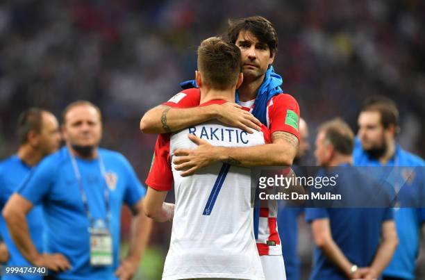 Vedran Corluka and Ivan Rakitic of Croatia look dejected following the 2018 FIFA World Cup Final between France and Croatia at Luzhniki Stadium on...