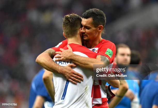 Dejan Lovren and Ivan Rakitic of Croatia look dejected following the 2018 FIFA World Cup Final between France and Croatia at Luzhniki Stadium on July...