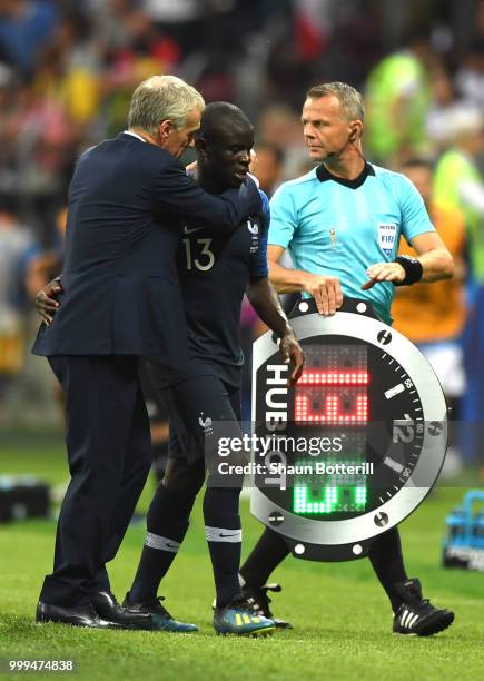 Didier Deschamps, Manager of France consoles Ngolo Kante of France after his substitution during the 2018 FIFA World Cup Final between France and...