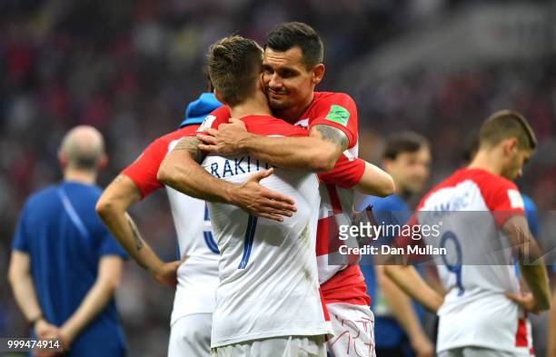 Dejan Lovren and Ivan Rakitic of Croatia look dejected following the 2018 FIFA World Cup Final between France and Croatia at Luzhniki Stadium on July...