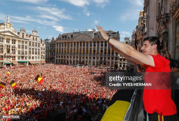 Belgium's goalkeeper Thibaut Courtois celebrates at the balcony in front of more than 8000 supporters at the Grand-Place, Grote Markt in Brussels...