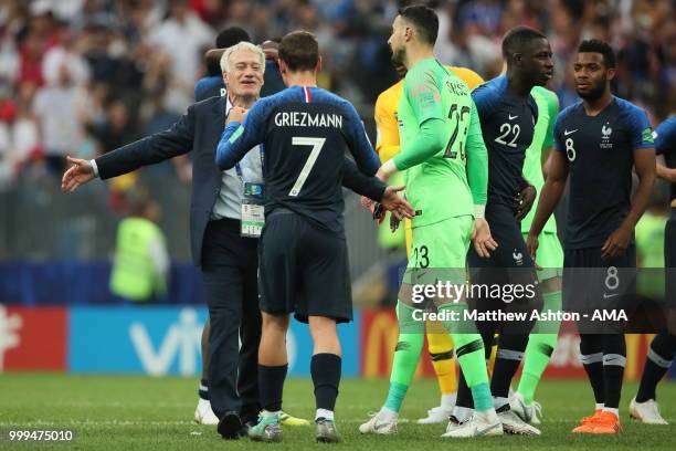 Delighted Didier Deschamps head coach / manager of France at full time with Antoine Griezmann of France during the 2018 FIFA World Cup Russia Final...