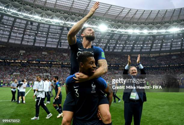 Presnel Kimpembe of France and Olivier Giroud of France celebrate following their sides victory in the 2018 FIFA World Cup Final between France and...