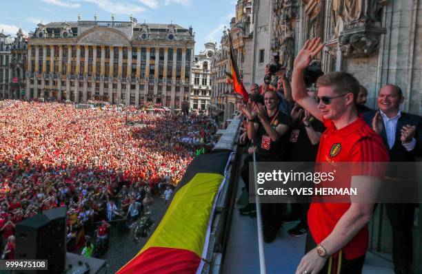 Belgium's Kevin De Bruyne celebrates at the balcony in front of more than 8000 supporters at the Grand-Place, Grote Markt in Brussels city center, as...