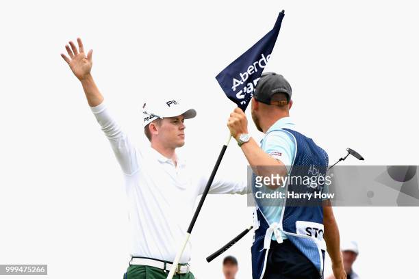 Brandon Stone of South Africa reacts to his eagle putt on hole sixteen during day four of the Aberdeen Standard Investments Scottish Open at Gullane...