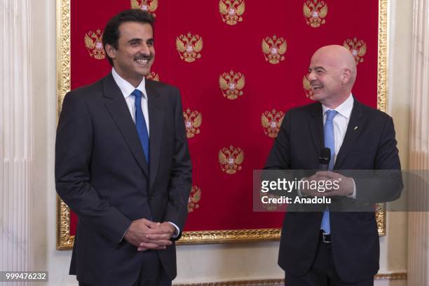 Emir of Qatar Sheikh Tamim bin Hamad Al Thani and FIFA President Gianni Infantino attend the handover ceremony for the 2022 World Cup at the Kremlin...