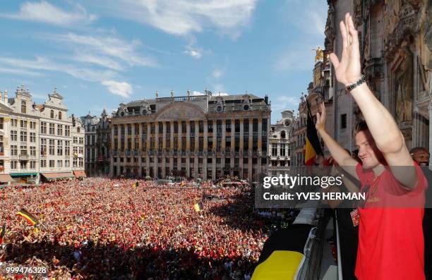 Belgium's goalkeeper Simon Mignolet celebrates at the balcony in front of more than 8000 supporters at the Grand-Place, Grote Markt in Brussels city...