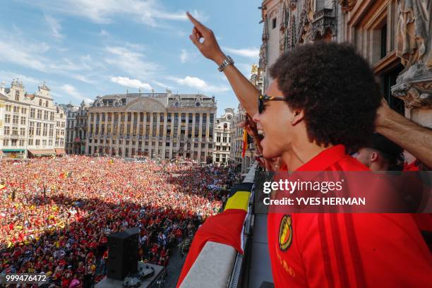 Belgium's Axel Witsel celebrates at the balcony in front of more than 8000 supporters at the Grand-Place, Grote Markt in Brussels city center, as...