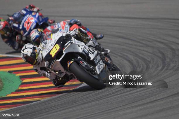 Alvaro Bautista of Spain and Angel Nieto Team leads the field during the MotoGP race during the MotoGp of Germany - Race at Sachsenring Circuit on...