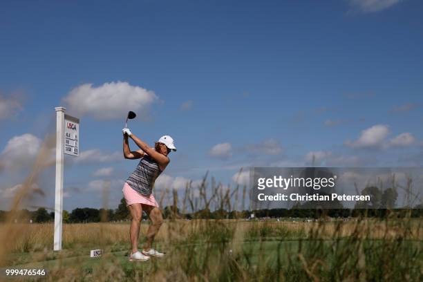 Juli Inkster plays a tee shot on the fourth hole during the final round of the U.S. Senior Women's Open at Chicago Golf Club on July 15, 2018 in...